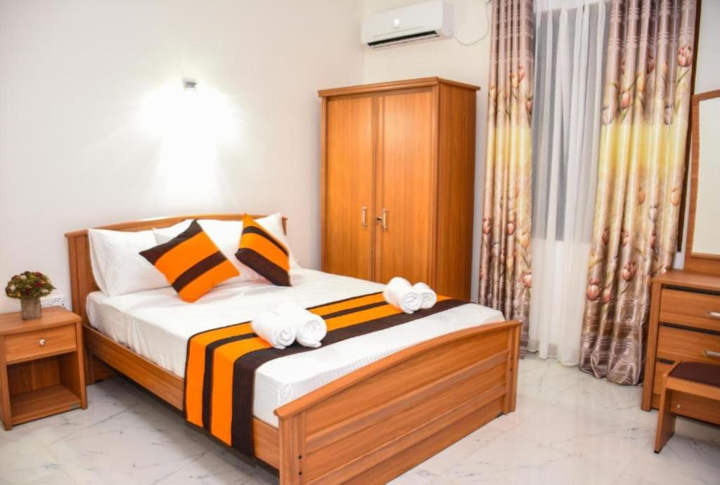 Postel nebo postele na pokoji v ubytování Mamma Raji Hotel - Freedom Paradise