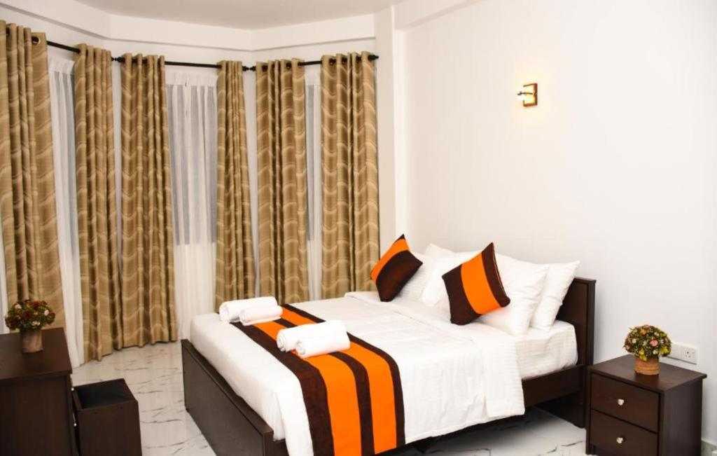 Postel nebo postele na pokoji v ubytování Mamma Raji Hotel - Freedom Paradise