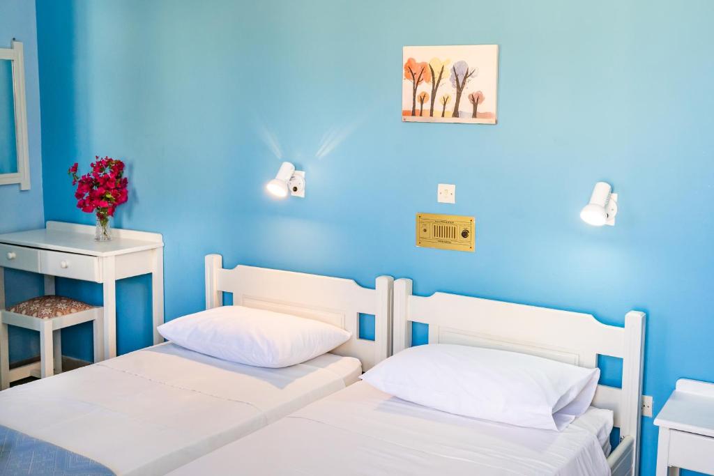Postel nebo postele na pokoji v ubytování P i g a d i a B a y