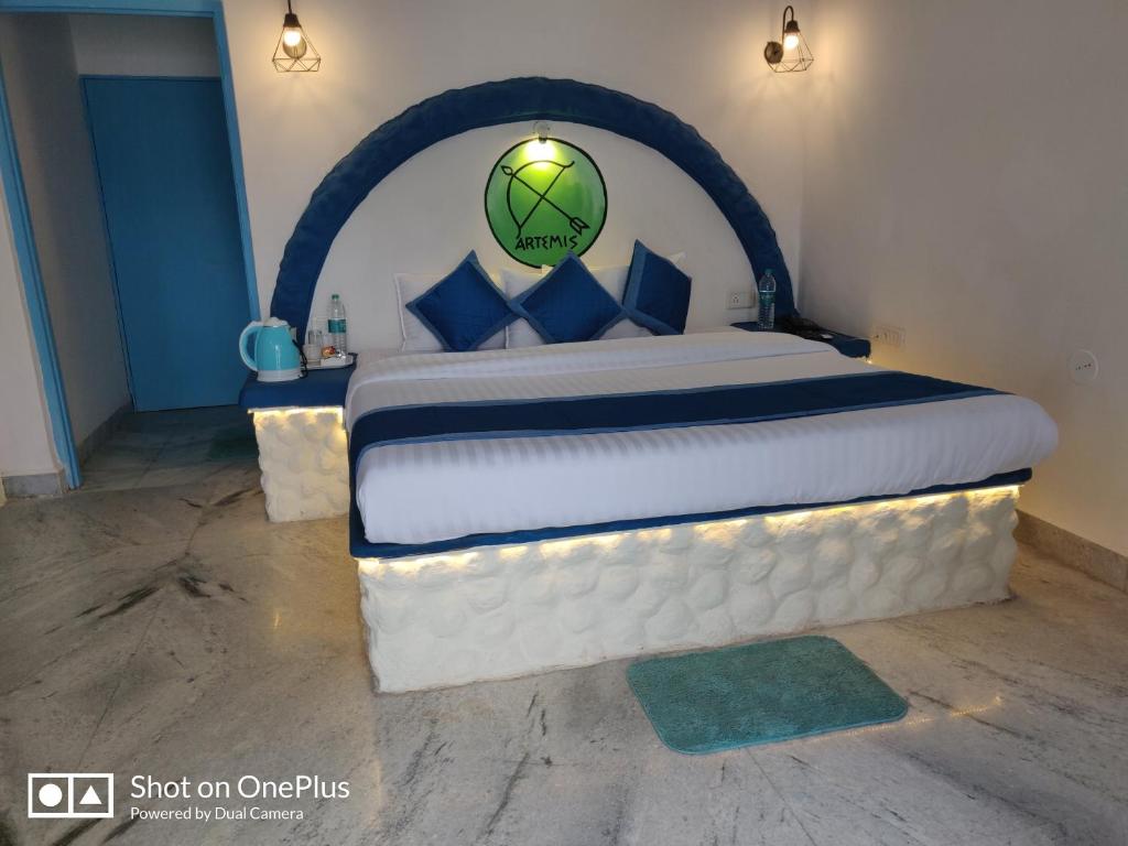 Postel nebo postele na pokoji v ubytování Makarios Boutique Hotel