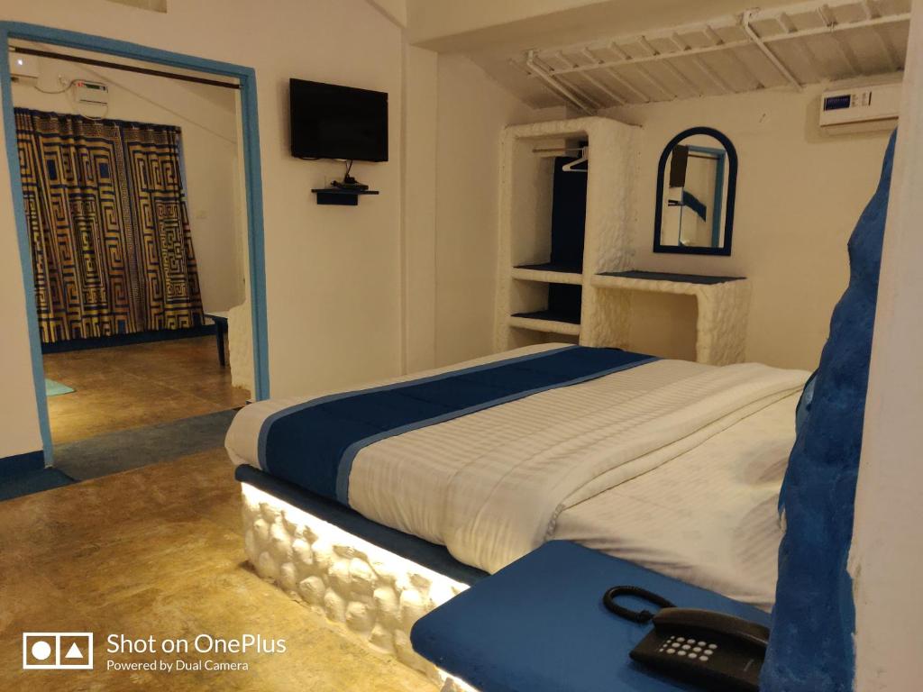 Postel nebo postele na pokoji v ubytování Makarios Boutique Hotel