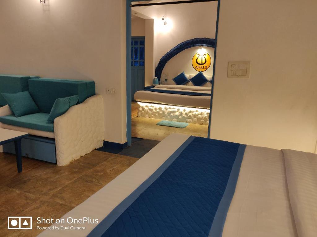 Postel nebo postele na pokoji v ubytování Makarios Boutique Hotel