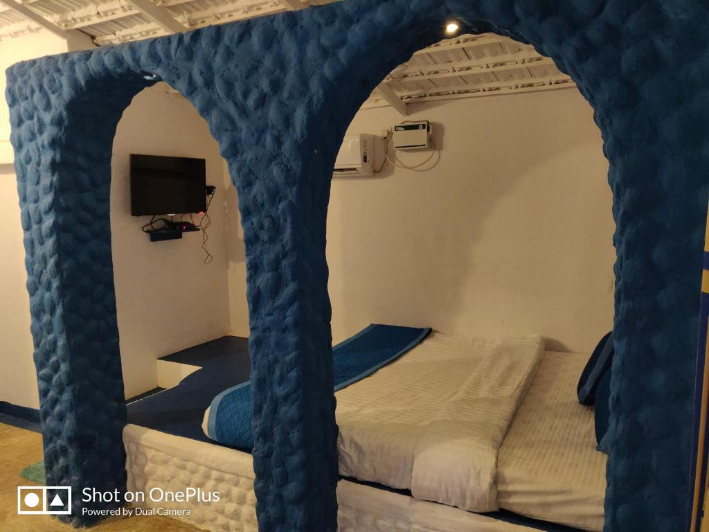 Postel nebo postele na pokoji v ubytování Makarios Boutique Hotel