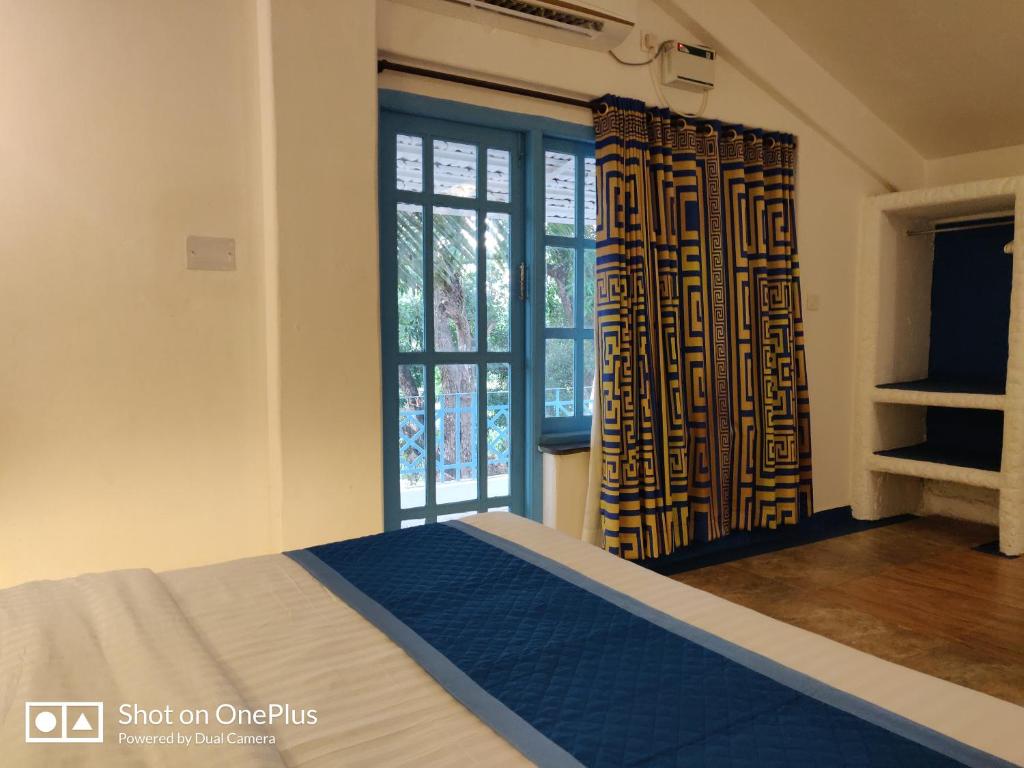 Postel nebo postele na pokoji v ubytování Makarios Boutique Hotel
