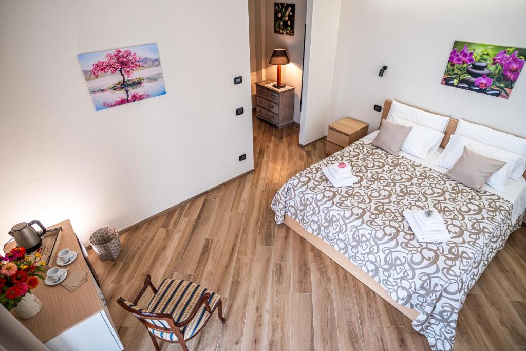 Postel nebo postele na pokoji v ubytování Casa Lidia Gavi