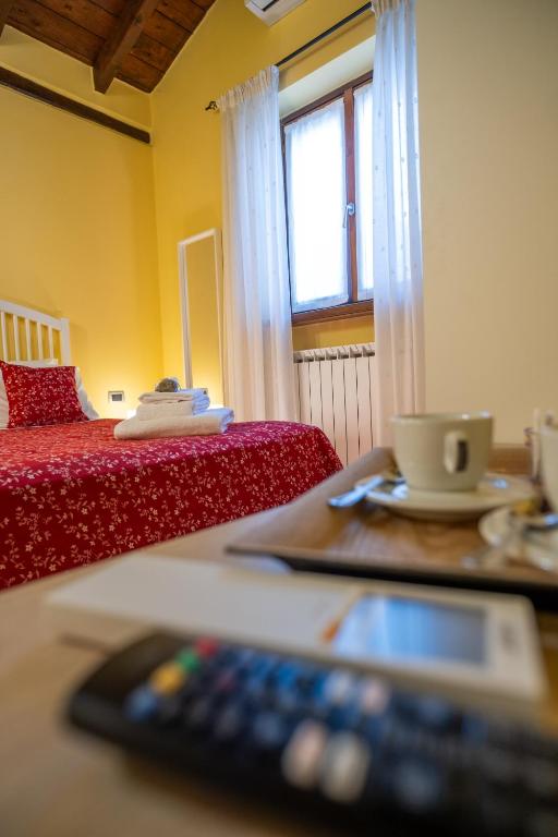 Postel nebo postele na pokoji v ubytování Casa Lidia Gavi