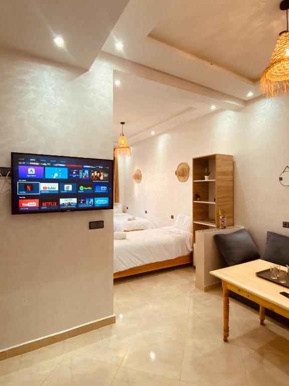 TV a/nebo společenská místnost v ubytování WOW beach house