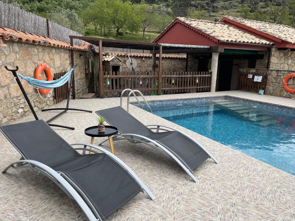 The swimming pool at or close to Casa Apartamento Rural U Penafrol