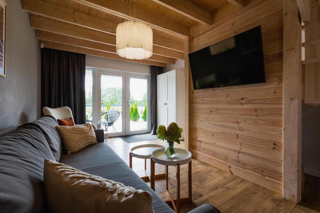 Telewizja i/lub zestaw kina domowego w obiekcie Ferienhäuser Natureck - Zakątek Natury