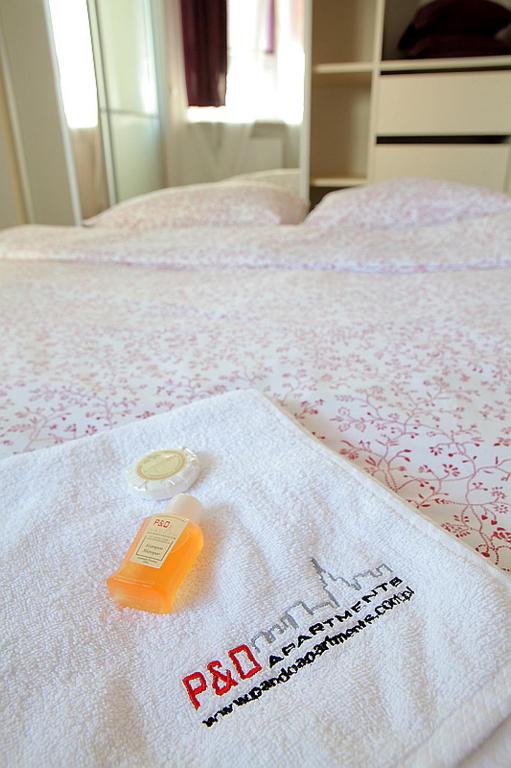 Posteľ alebo postele v izbe v ubytovaní P&O Serviced Apartments GDANSKI STATION