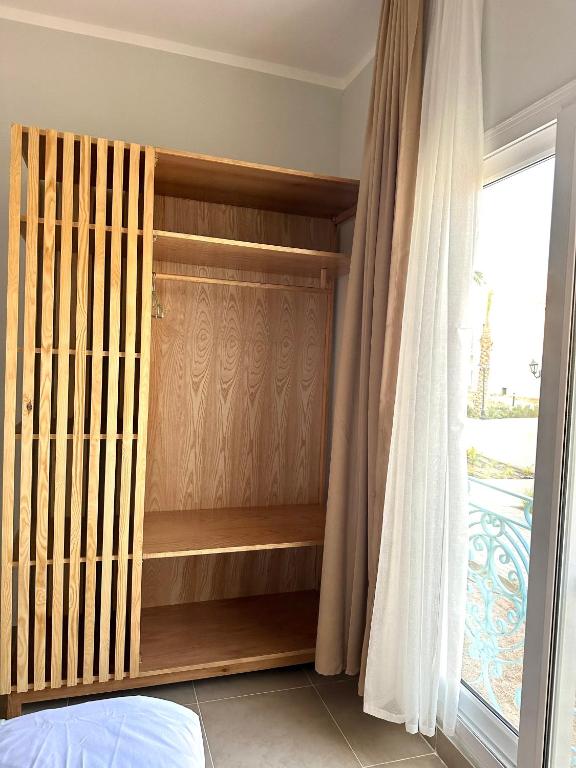 Postel nebo postele na pokoji v ubytování Babushka Boutique Hotel-Dahab