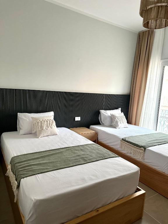 Postel nebo postele na pokoji v ubytování Babushka Boutique Hotel-Dahab