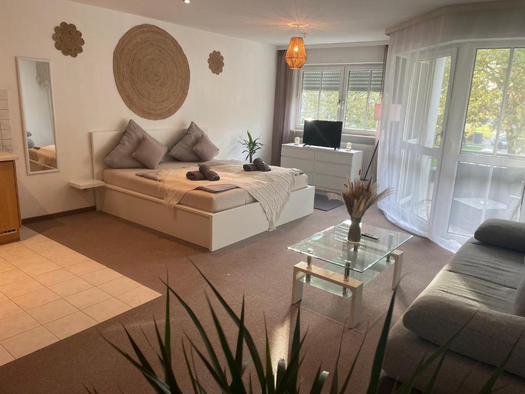 Posezení v ubytování Kingsize Bett BOHO Apartment mit Tiefgarage nähe Salzburg