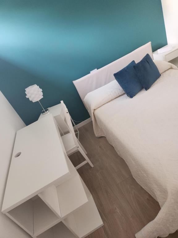 Postel nebo postele na pokoji v ubytování CASA CLEO