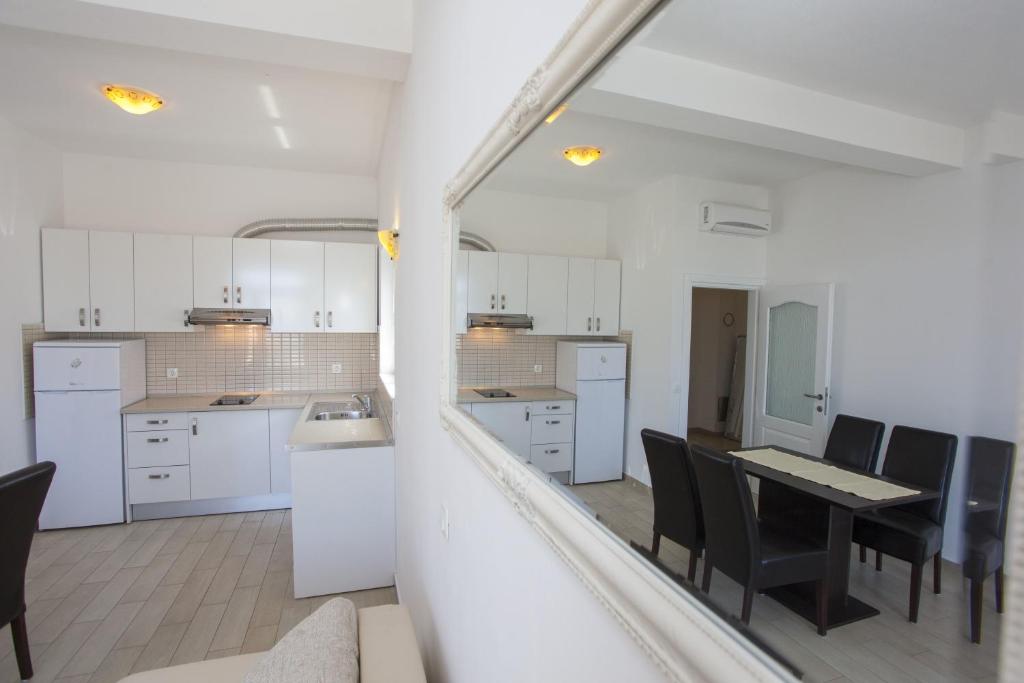 Kuchyň nebo kuchyňský kout v ubytování Apartment Marco