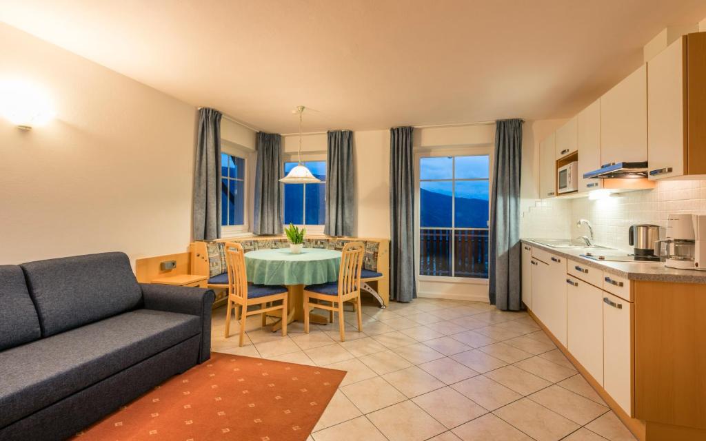 Kuchyň nebo kuchyňský kout v ubytování Residence Treyer