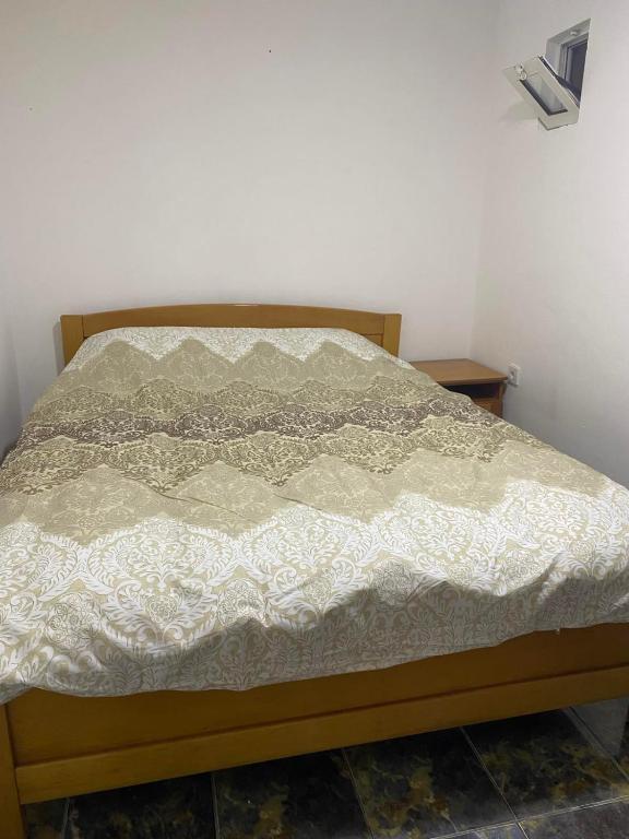 Postel nebo postele na pokoji v ubytování Apartments Mušović