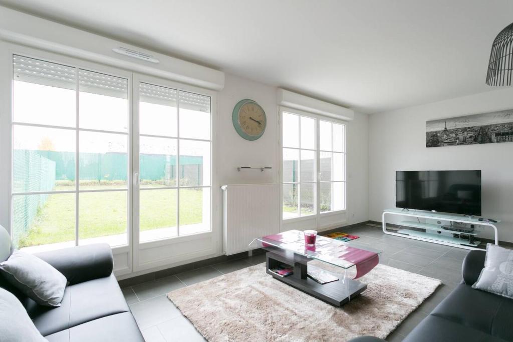 Et tv og/eller underholdning på Big House 2 minutes from Disneyland Paris