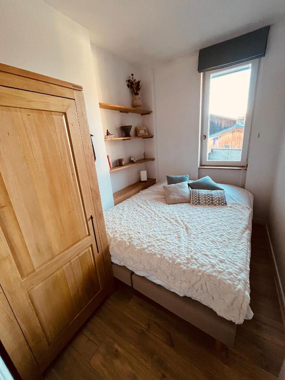 Posteľ alebo postele v izbe v ubytovaní Superbe appartement COURCHEVEL VILLAGE