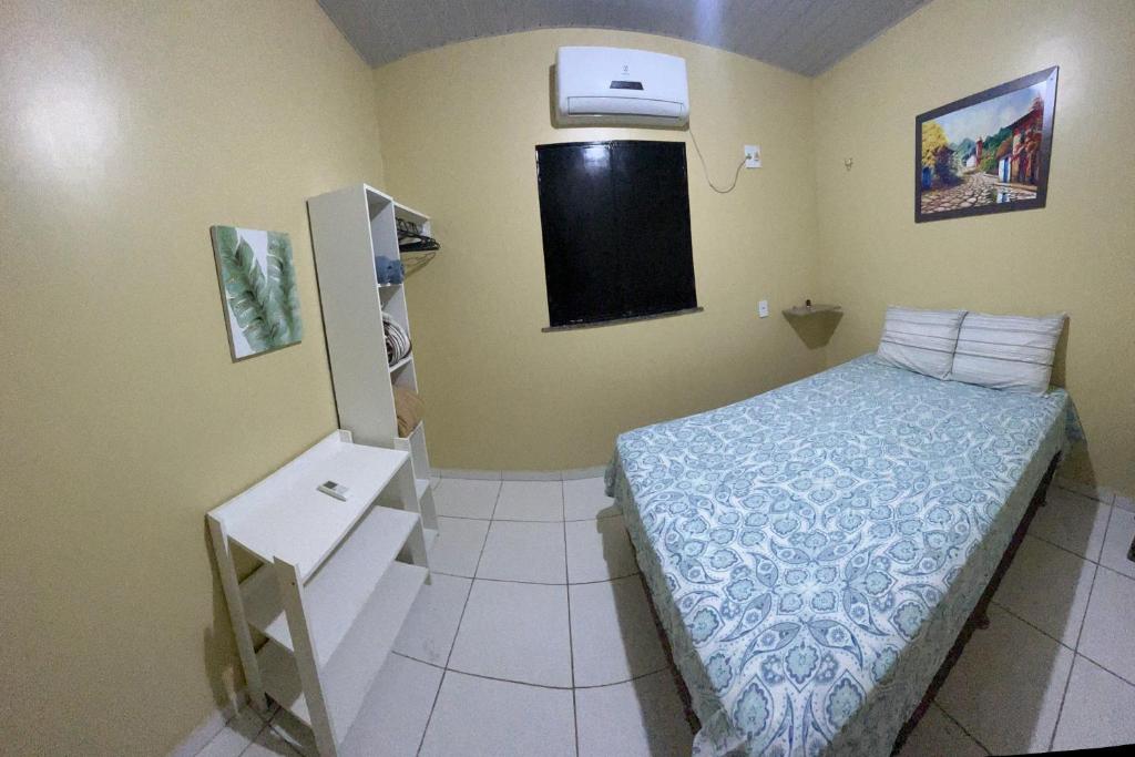Postel nebo postele na pokoji v ubytování Casa Boto Tucuxi 2
