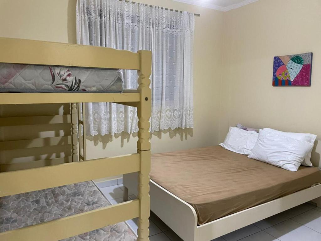 Voodi või voodid majutusasutuse Apartamento em Frente a Praia - não vista mar toas