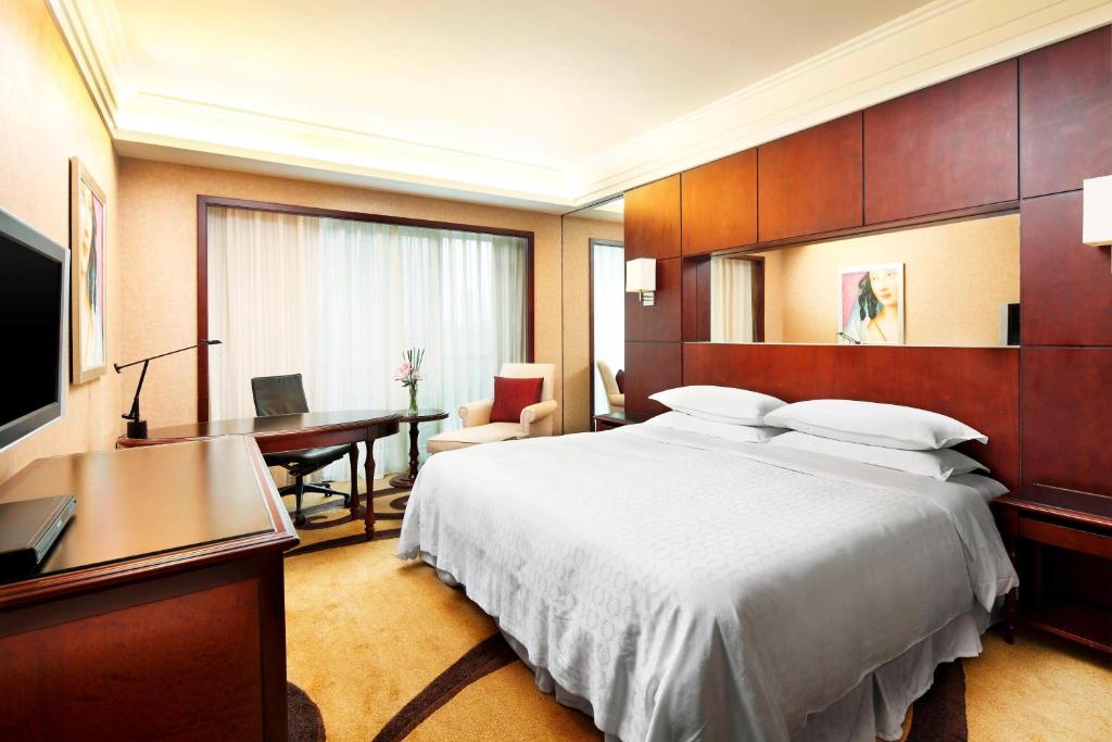 TV a/nebo společenská místnost v ubytování Sheraton Shenzhen Futian Hotel