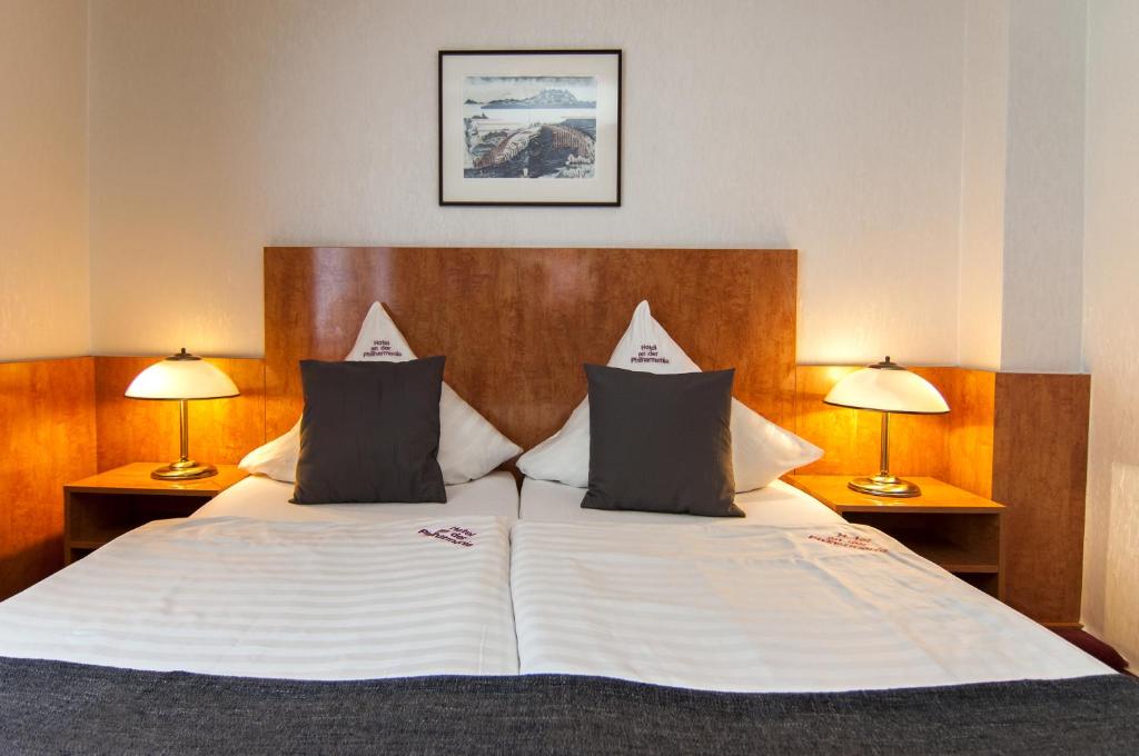 Postel nebo postele na pokoji v ubytování Hotel An der Philharmonie