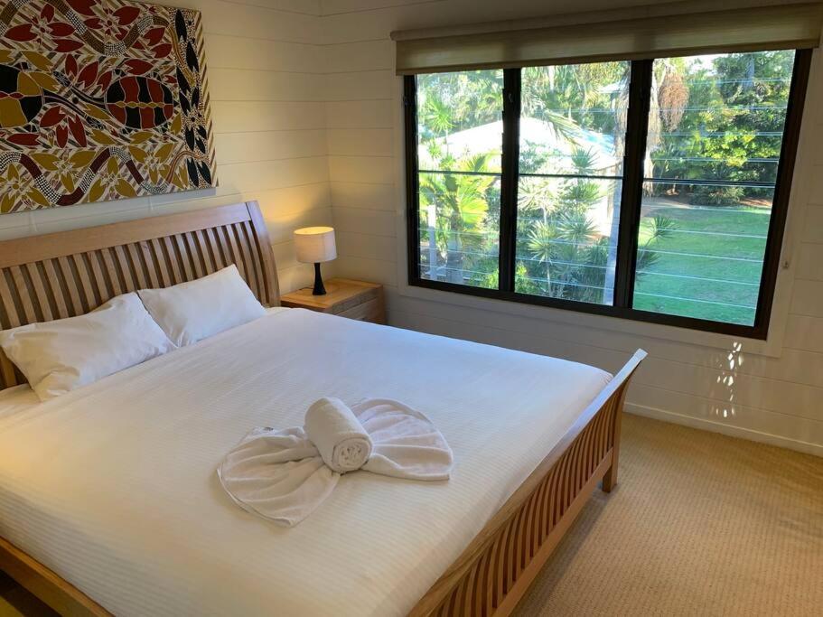 Postel nebo postele na pokoji v ubytování Archies Beach Abode