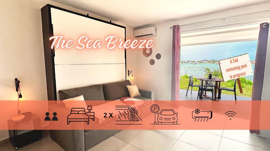 Posezení v ubytování Le Sea-Breeze - Beau studio piscine VUE LAGON