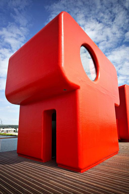 a red object on top of a building at Botel in Amsterdam