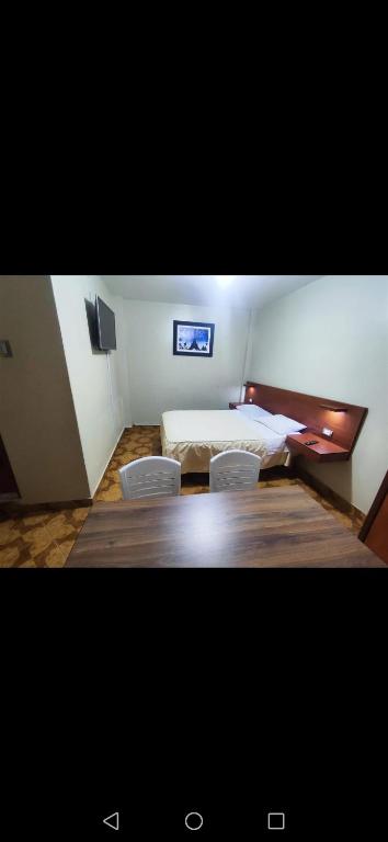 Letto o letti in una camera di Hostal Continental