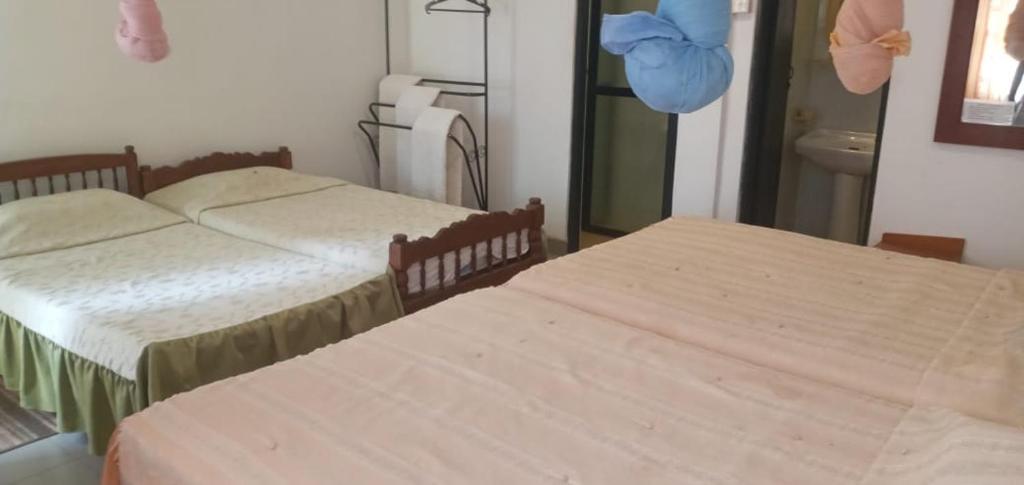 Postel nebo postele na pokoji v ubytování Hotel Shalini