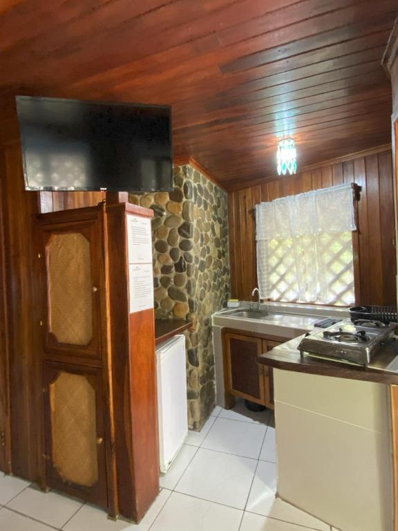 Kuchyň nebo kuchyňský kout v ubytování Bungalows Malú