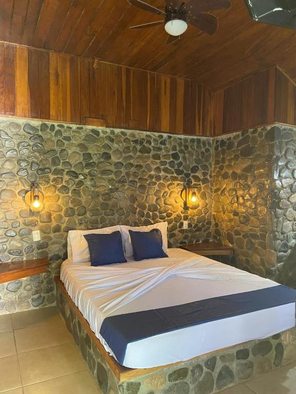 Postel nebo postele na pokoji v ubytování Bungalows Malú