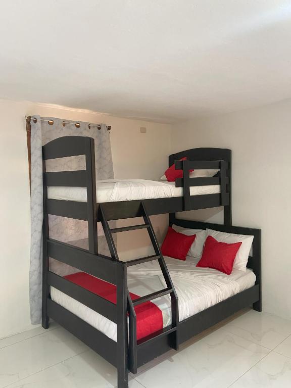 Postel nebo postele na pokoji v ubytování Bungalows Malú