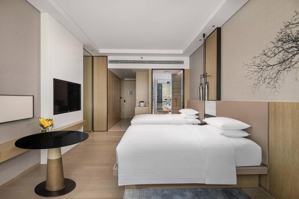 Courtyard by Marriott Chengdu Southにあるベッド