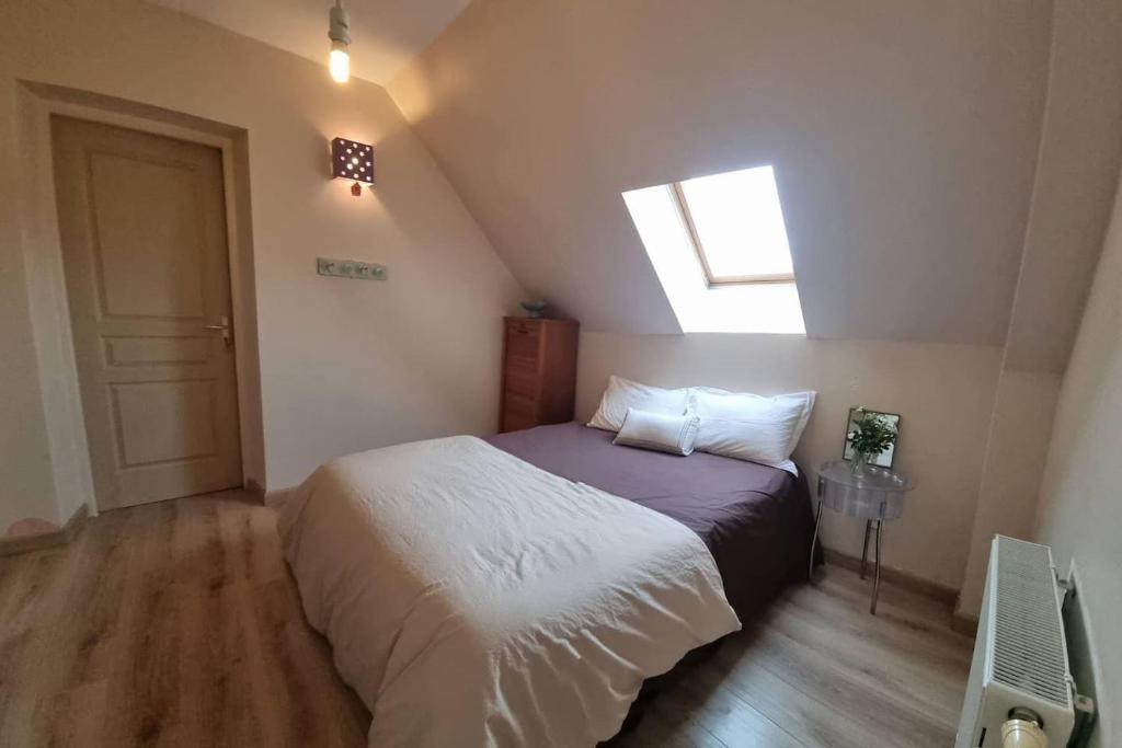 Postel nebo postele na pokoji v ubytování Villa des Climats Bourgogne