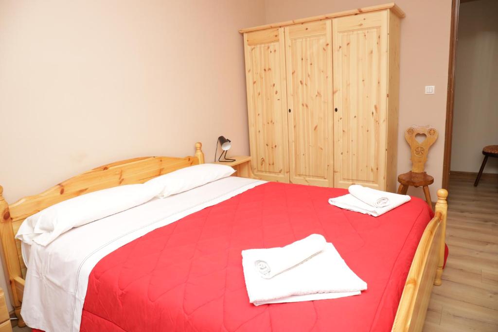 Posteľ alebo postele v izbe v ubytovaní Casa Vacanze Limone