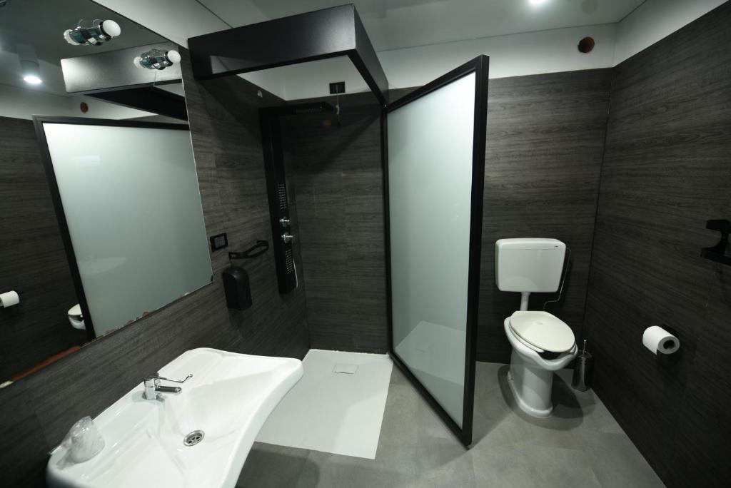 Koupelna v ubytování Hotel Celis