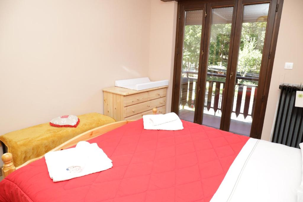 Posteľ alebo postele v izbe v ubytovaní Casa Vacanze Limone
