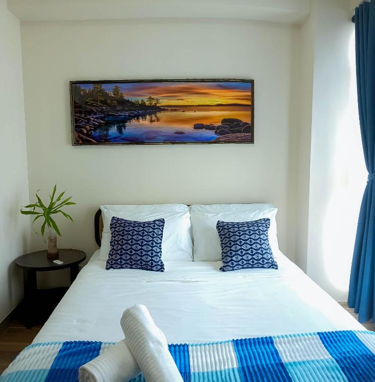 Postel nebo postele na pokoji v ubytování L'eau Bleue Boracay Condotel