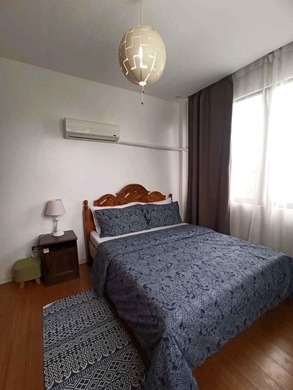 Postel nebo postele na pokoji v ubytování RLJ Beach House