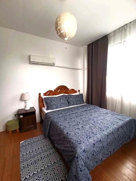 Postel nebo postele na pokoji v ubytování RLJ Beach House