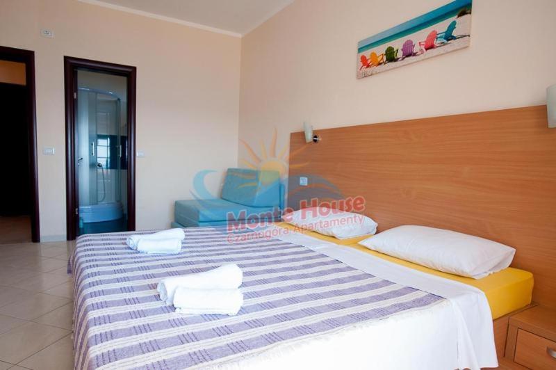 Postel nebo postele na pokoji v ubytování APARTMANI LUX SEA