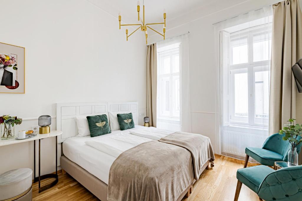 Postel nebo postele na pokoji v ubytování Beletage-Boutique Hotel