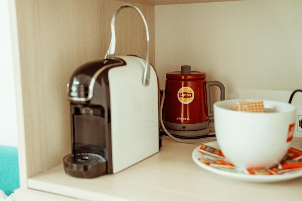 Coffee and tea making facilities at Massanè Casa Vacanza