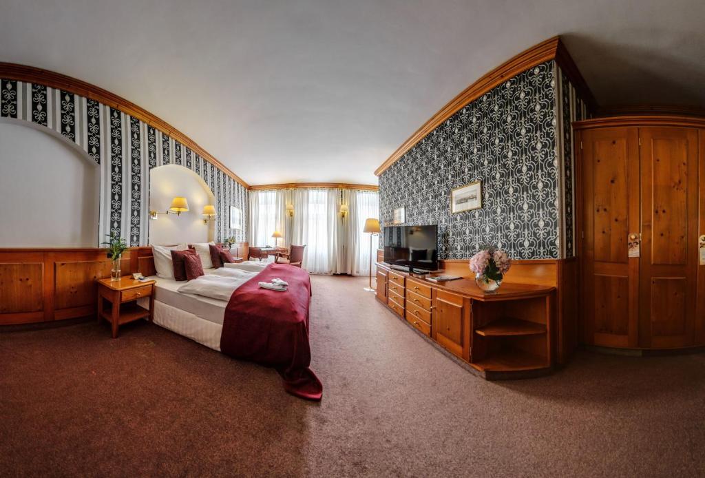 En eller flere senger på et rom på Akzent Hotel Goldner Hirsch