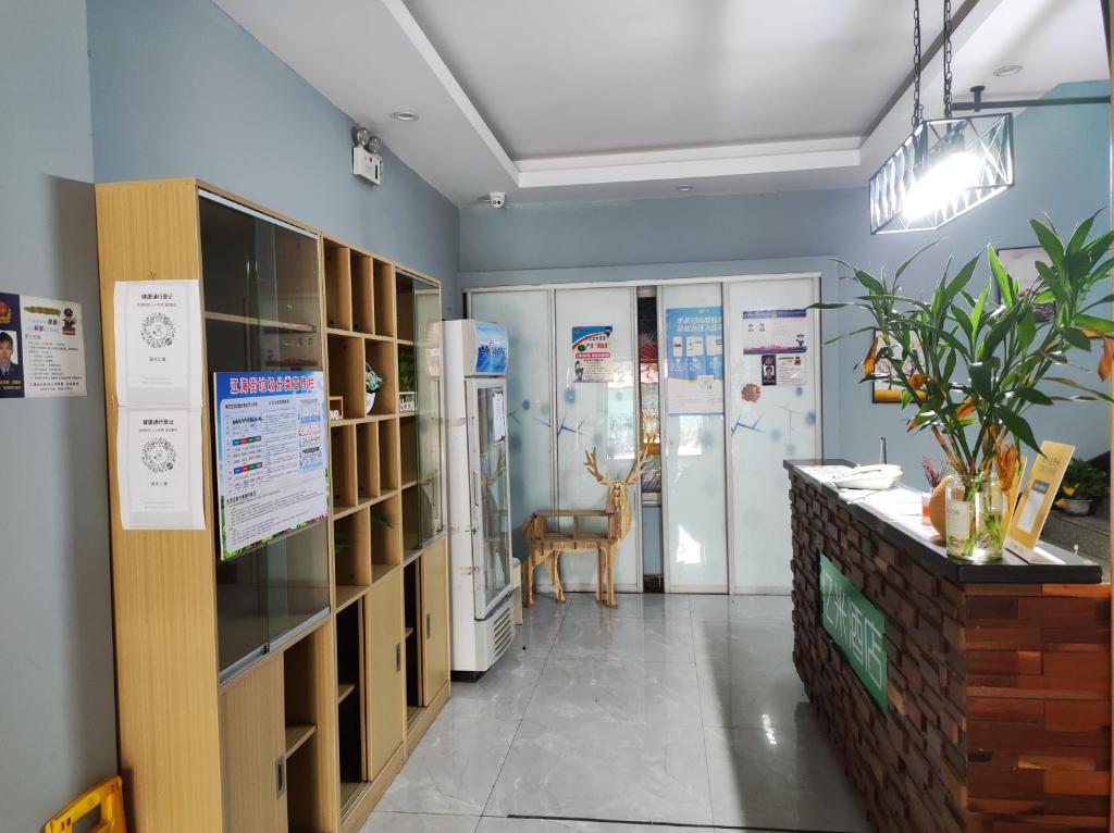 Vstupní hala nebo recepce v ubytování EMi Hotel Guangzhou International Convention and Exhibition Center Guangzhou Tower Branch