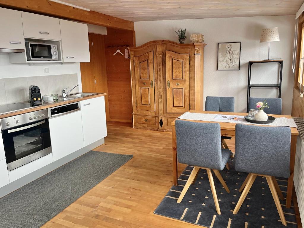 Kuchyň nebo kuchyňský kout v ubytování WÄLDERHAUS Apartments