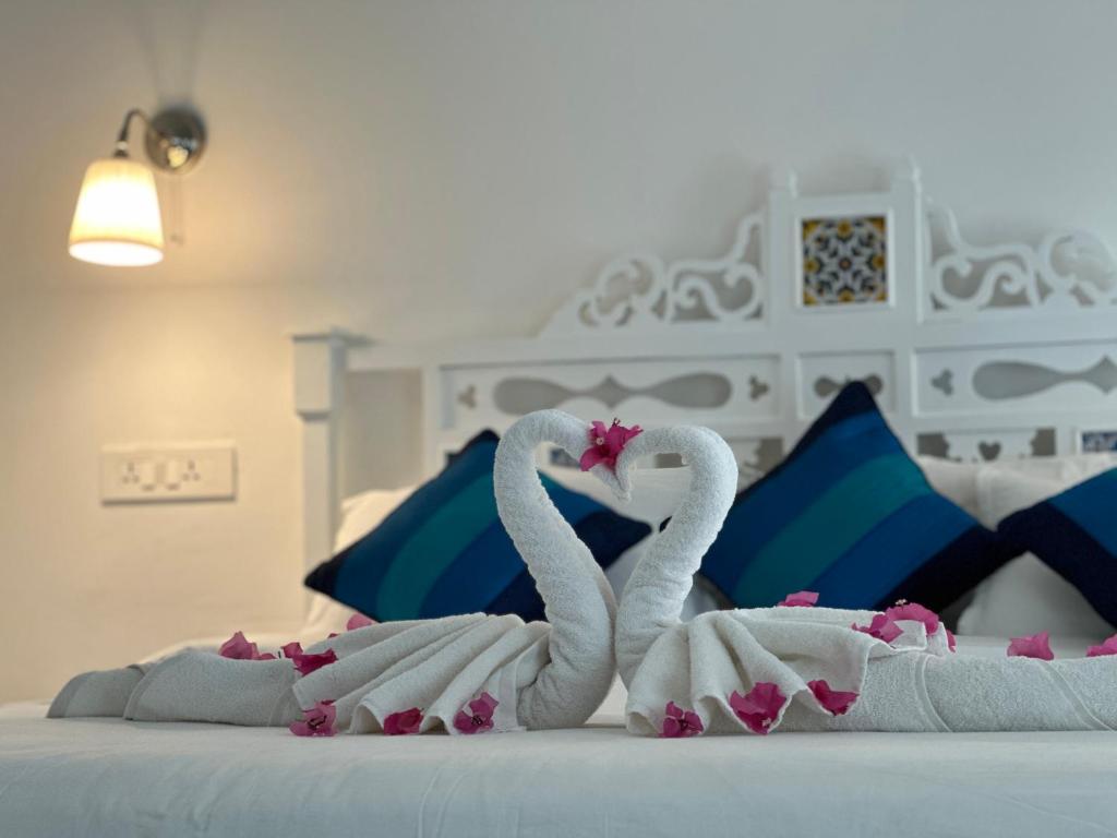 Postel nebo postele na pokoji v ubytování Oceanic - Luxury Boutique Hotel